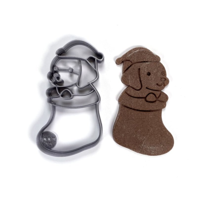 Pies w foremce do ciastek w kształcie skarpetki